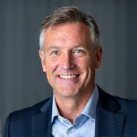 Professional headshot of Alistair MacMillan